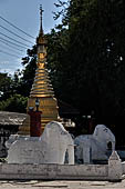 Bagan Myanmar. Shwezigon pagoda. The precinct is full of numerous images, inscribed bells, stone inscriptions and other paraphernalia.  